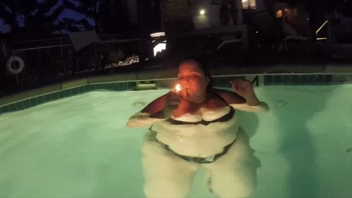 SSBBW Monika Mynx is smoking in the pool showing off her body underwater