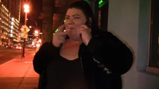 Juicy Jazmynne is smoking outdoors in the cold talking on the phone and is blowing smoke out her sexy lips