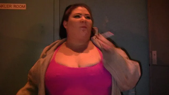 BBW Juicy Jazmynne is smoking outdoors in a pink top and is blowing smoke out her sexy lips