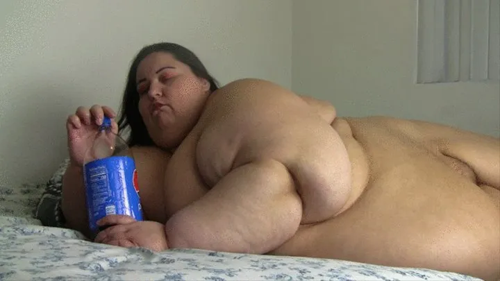 SSBBW Apple Bomb is drinking a 2liter and burping and playing with her huge stomach