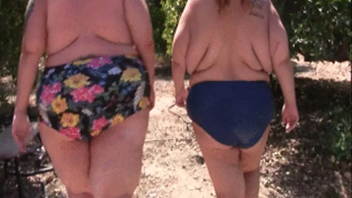 BBW Lola LoveBug and Monika Mynx are walking around in the orchards and then stop for a smoking break and enjoy a cigarette