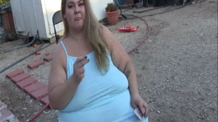 BBW Lola LoveBug is sitting outside smoking see the ash on the cig and shows off her tits ass and belly