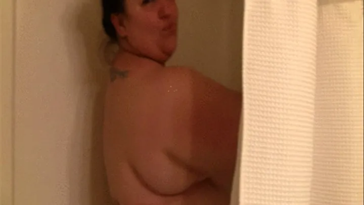 BBW Bella Bendz is in the shower shaving her pussy and armpits
