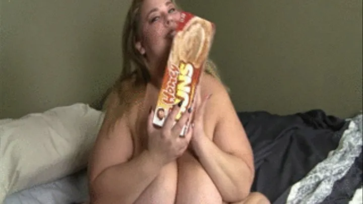 BBW Lola LoveBug is eating Honey Buns and fingering her clit and pussy then fucks herself with a hitachi