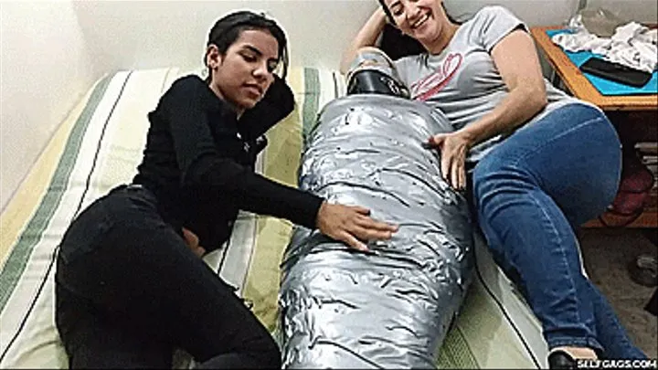 Laura, Katherine & Maria in: Katherine Martinez Collared And Pantyhose Hooded In Multilayered Mummification Bondage