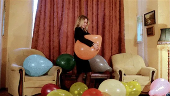 Blonde plays with balloons