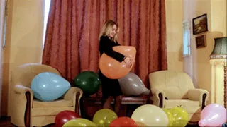 Blonde plays with balloons