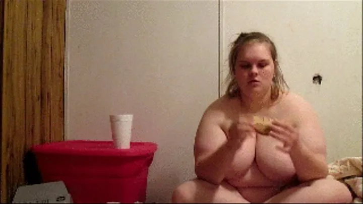 Eating a sandwich naked and drinking sprite