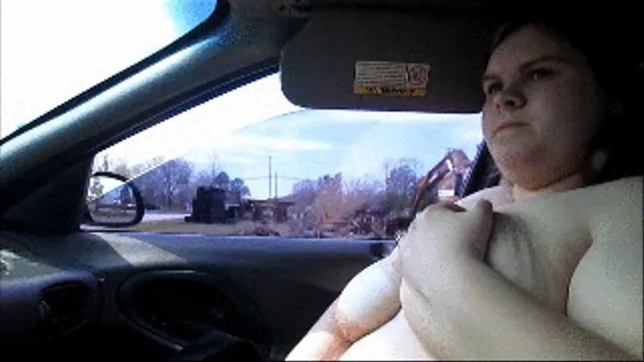 Riding around town naked showing off my tits and shacking them