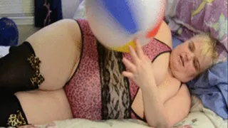 Princess squashes a beach ball