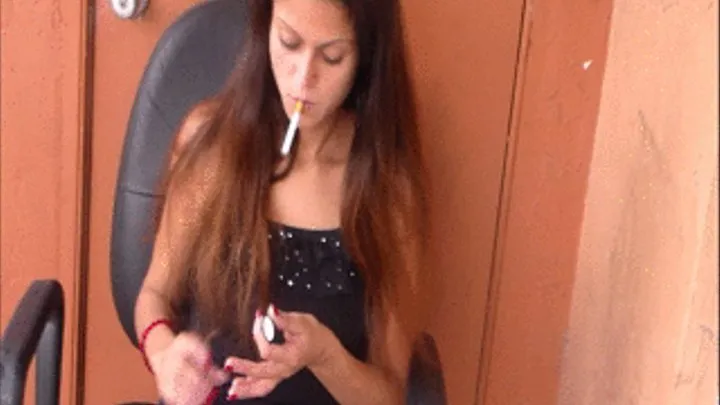 Yesenia has a quick smoke break