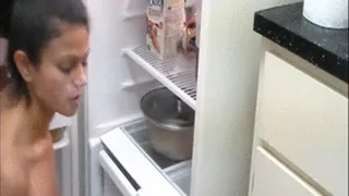 Yesenia smokes while cleaning the fridge naked