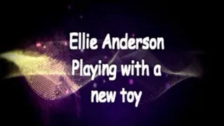 Ellie Anderson plays with a toy