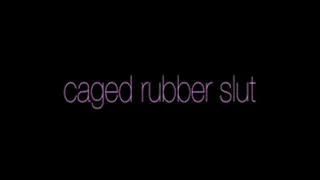 Caged rubber slut
