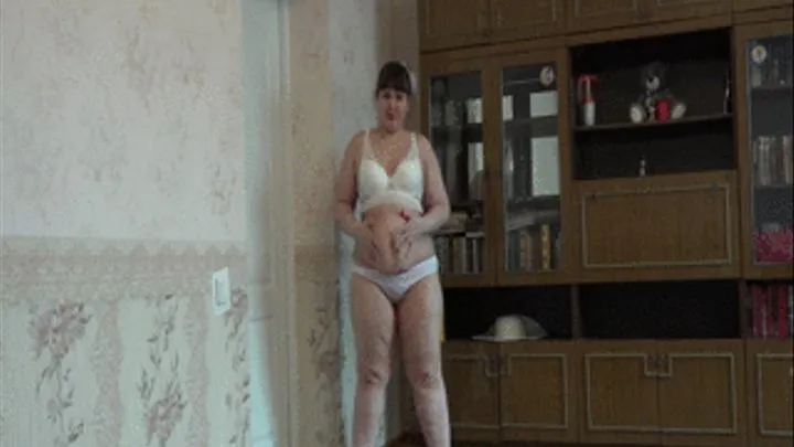 A fat girl in white socks masturbates her hairy pussy with her fingers and a bottle