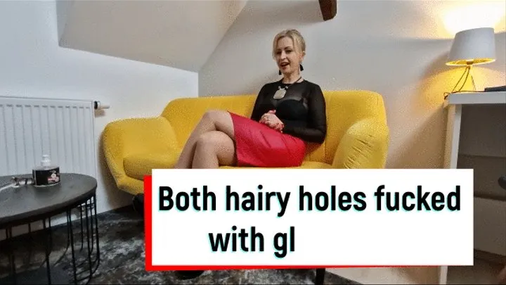 Both hairy holes fucked with glass dildo