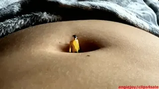 Guy digging into her navel