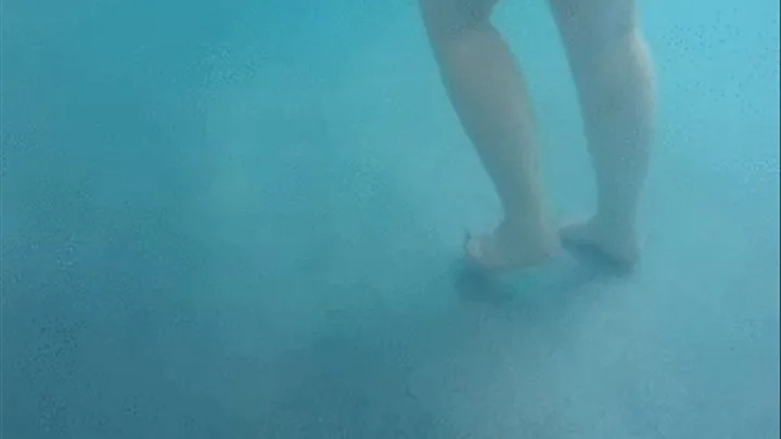 Candid underwater feet