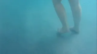 Candid underwater feet