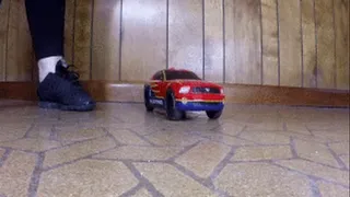 Cara crushing a car with fans black sneakers.