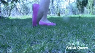 Walk on the grass in pink ballet flats