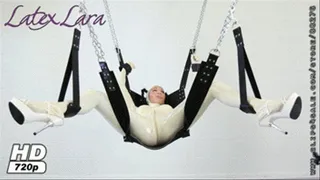 Gagged, fixated and used by two Rubberboys on the swing