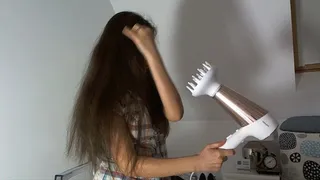 Playing with a hairdryer on my long hair