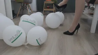 breaking ballons with high heels