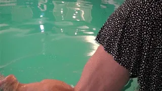 Tempest showing off calves in the pool