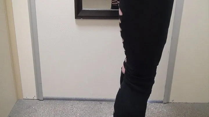 Tempest in ripped leggings in the changing room