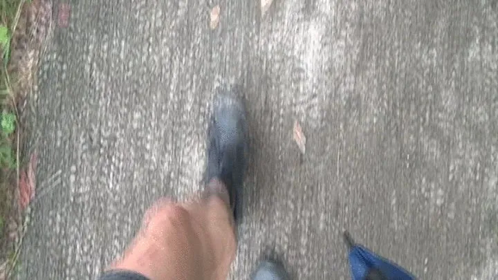 Tempest walking in black sneakers after hike