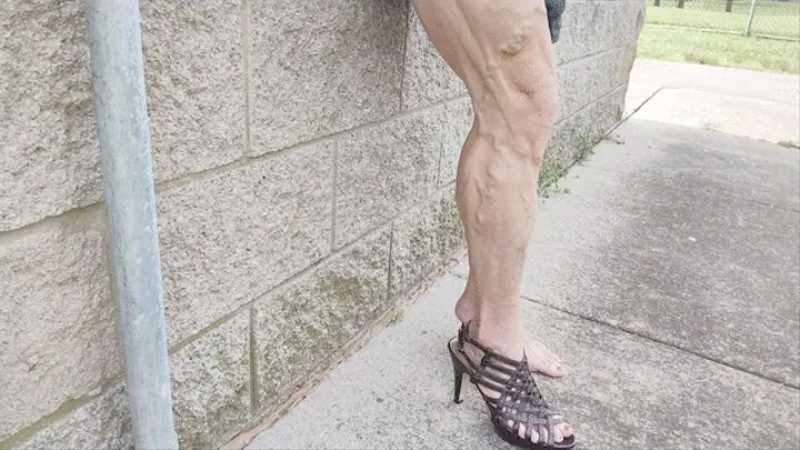 Strappy heels and veiny legs