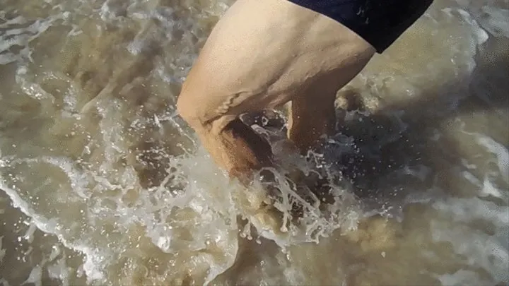 Walking in the waves and sand