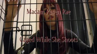 Caged While She Shoots