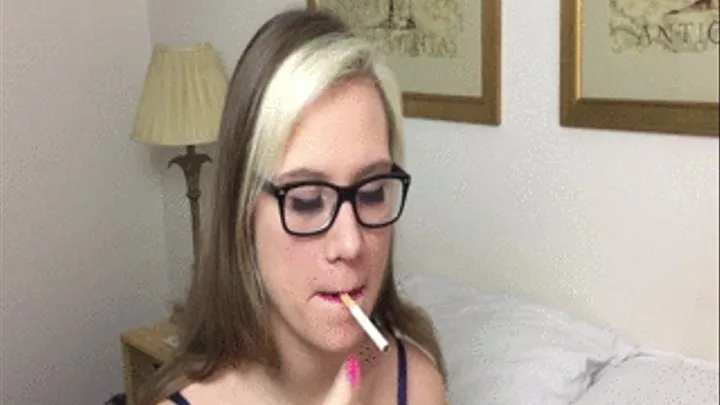 British girls has a close up cigarette smoking with lipstick and braces