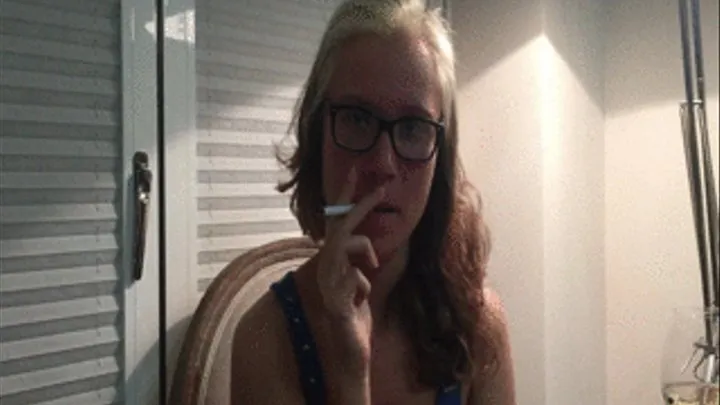 Watch a sexy blonde smoke for you