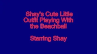 Shay in a Cute Outfit Playing With Her Beachball