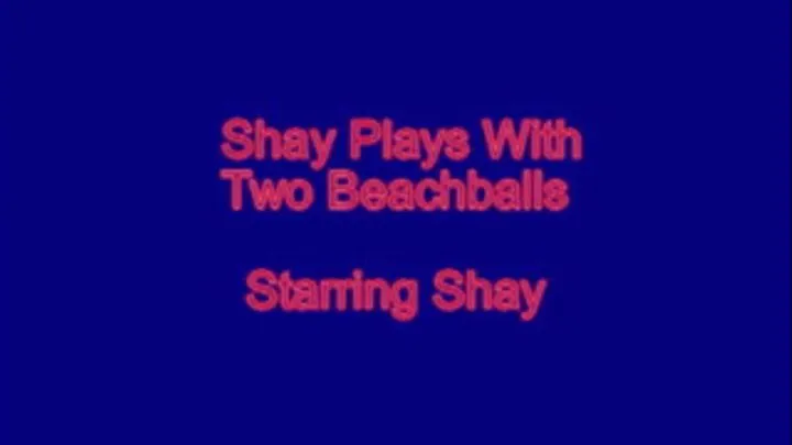 Shay Plays With Two Beach Balls