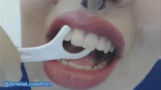 Flossing with latex gloves on