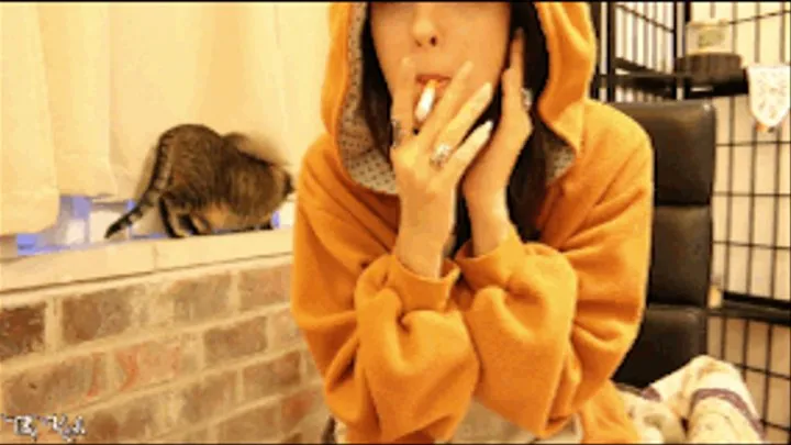 Smoking a cigarette in bear onesie