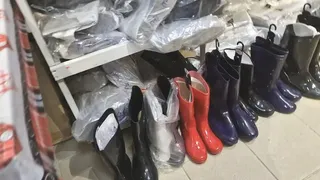 Sexy and shiny red rubber rain boots