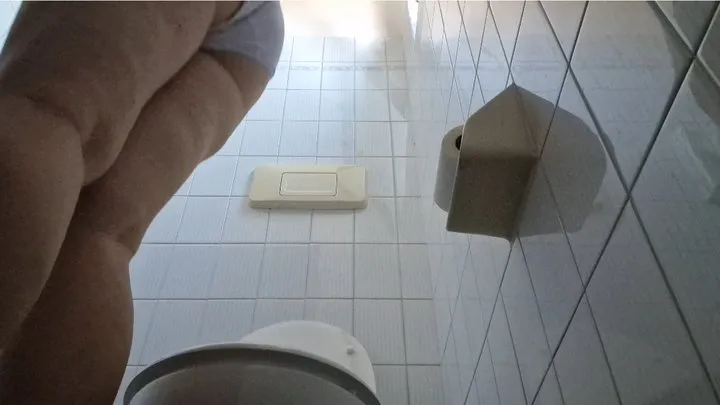 Change stinky diaper in a public toilet