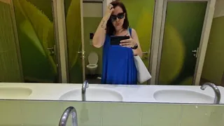 Sexy peeing in a mall bathroom