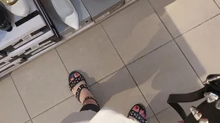 Delightful feet in public shop