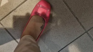 Sexy Italian feet and ballerinas in a public shoe shop