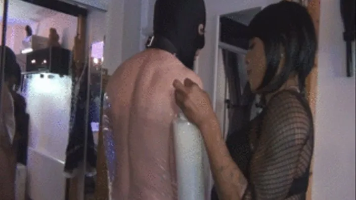 Clingfilm wrapped slave gets his nipples twisted by black mistress