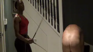 Ass caning the white slave on the stairs