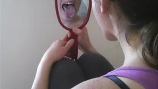 Checking my teeth in a mirror