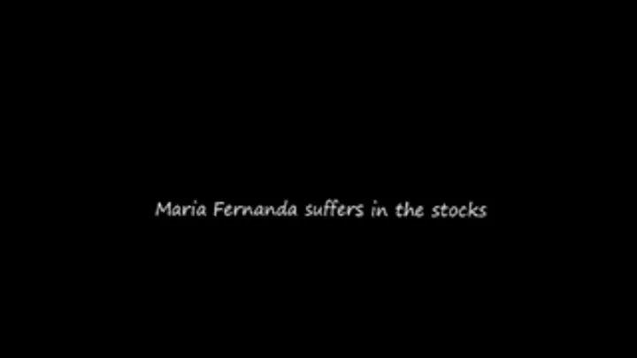 Maria Fernanda suffers in the stocks