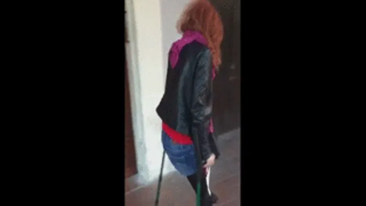 LADY DEMONIQUE WALKING ON THE STREET WITH CRUTCHES